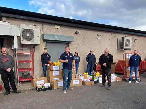 Members of Cairncastle Flute Band delivered the packs to care workers and NHS staff in the area.