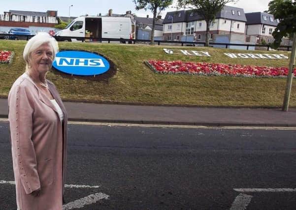 Alderman Audrey Wales MBE at the new floral tribute to NHS and keyworkers in Ballymena