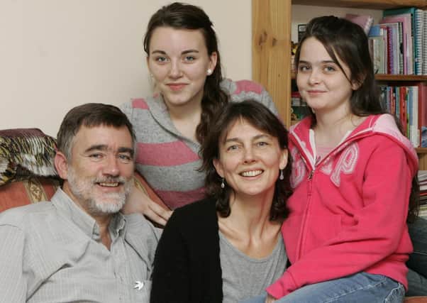 Lucia Quinny Mee, at home in Ballycastle with her parents and sister