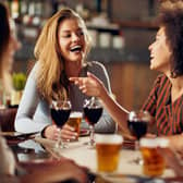 Generic photo of friends drinking in a bar. See PA Feature WELLBEING Alcohol. Picture credit should read: iStock/PA. WARNING: This picture must only be used to accompany PA Feature WELLBEING Alcohol.