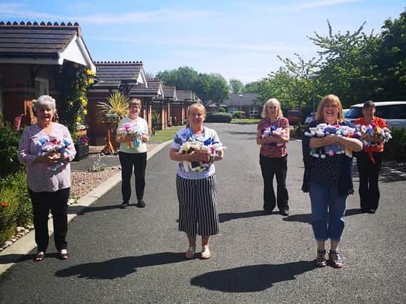 A team from Barn Halt Cottages, Radius Housing crafted teddies for children affected by domestic abuse.