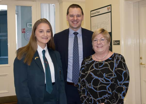 Banbridge Academy student Eve Elliott has been selected for the National Youth Choir of Great Britain. Included is principal Robin McLoughlin