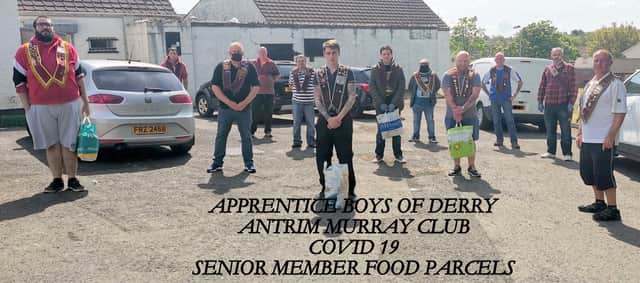 Members of Antrim Apprentice Boys of Derry Murray Club delivering food and essentials to their senior brethren
