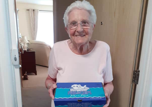 Tenant Olive Agnew receiving her chips