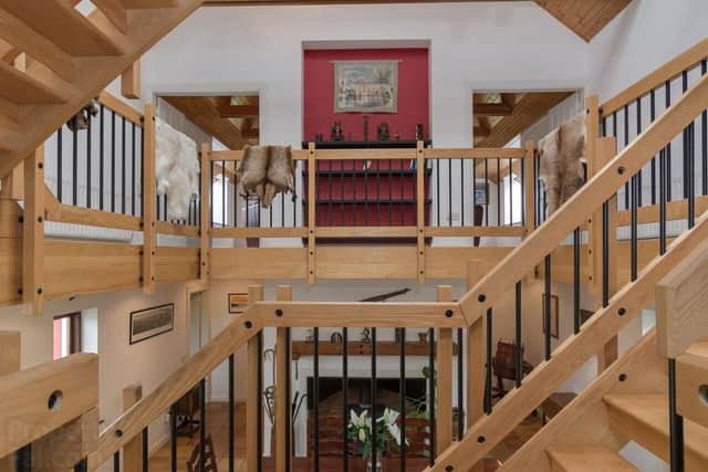 A solid ash open tread staircase leads from the reception hall and dining area to the first and second floor.