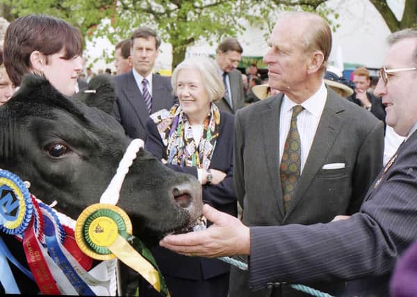The Duke of Edinburgh inspects a Champion Bull at the 1996 Balmoral Show. Picture: News Letter archives