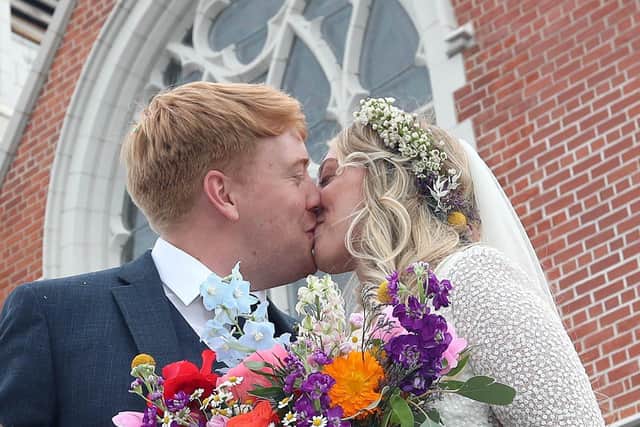 You may now kiss the bride: Paddy and Rebecca Smyth married at Cregagh Presbyterian Church. 
PICTURE BY STEPHEN DAVISON