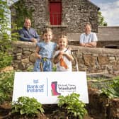 Pictured in Donagh Cottage Farm in Donaghcloney is Richard Primrose, Bank of Ireland UK Agri-Business Manager with Bank of Ireland Open Farm Weekend chairman and UFU deputy president David Brown with sisters Molly (5) and Edith Tumelty (4).  Picture by Brian Morrison.