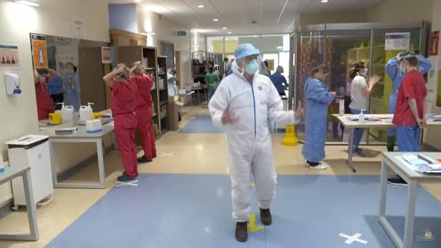 A still from a Channel 4 news bulletin on April 29, showing reporter Paraig O’Brien in Craigavon Area Hospital, a Covid-19 response centre; during the broadcast Dr Gareth Hampton said that patient volumes at the hospital were as low as 30% some days, after the wards were rejigged for Covid-19 care