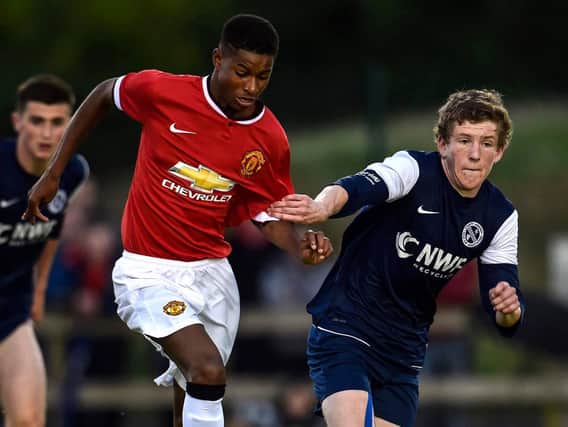 Marcus Rashford with Manchester Uniteds Premier side at STATSports SuperCupNI in 2014.