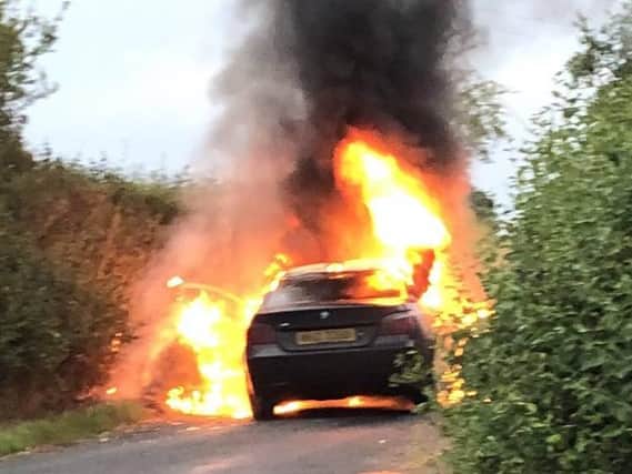 PSNI picture of BMW on fire near Tobermore.