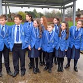 Pupils of St John the Baptist's College from the Maghery Area who are forced to wait until almost 5pm to get a bus home each day. INPT47-203.