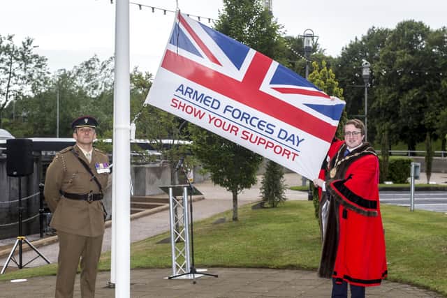 The Mayor, Councillor Nicholas Trimble and Lieutenant Colonel Chris Wood promote the support for Armed Forces Day 2020 in the Lisburn Castlereagh area.