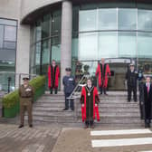 Pictured at the council's annual ceremony to raise the Armed Forces Day Flag are: (front l-r) Lieutenant Colonel Chris Wood; the Mayor, Councillor Nicholas Trimble; David Burns, Chief Executive and Alderman Paul Porter, Corporate Services Committee Chairman; (middle l-r) Commander Neil Meharg and Wing Commander Steve McCleery; (back l-r) Alderman Stephen Martin, Vice-Chair of Corporate Services Committee; Alderman James Tinsley, Armed Forces Champion and Andrew Carlisle, bugler.