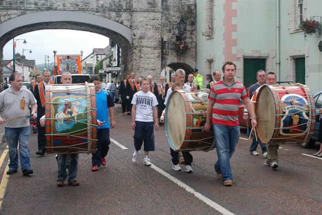 Lambeg drummers in action at the Braid District parade in Carnlough. LT29--010 PSB