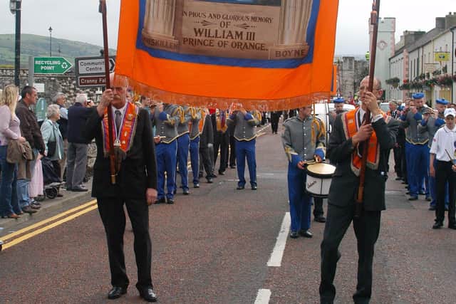 Glenarm LOL 1121 members on parade in Carnlough. LT29--014 PSB