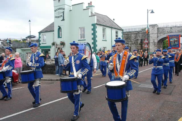 Carnalbana Flute Band parading through Carnlough. LT29--011 PSB
