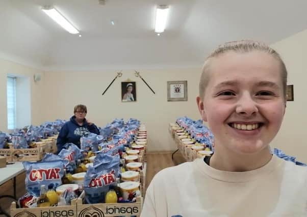 Jill and Gemma Conn preparing boxes to be delivered around Drumbo