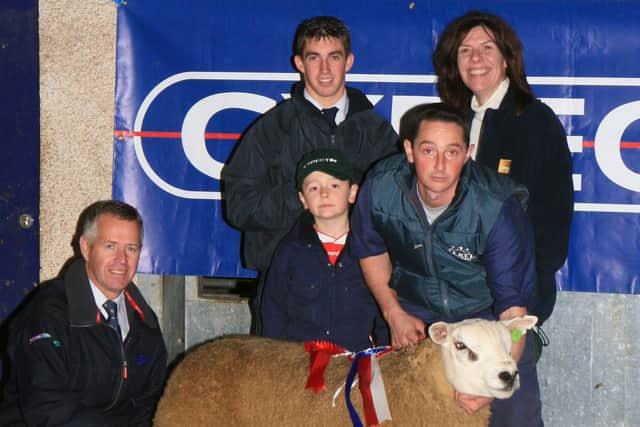 The champion Texel at the show and sale at Ballymena in October 2008 was owned by Alastair and Jack Gault, they are with sponsor Joe Crawford, David Chestnutt and Maura Hill