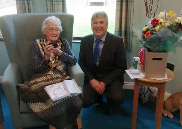 Mrs Moira Campbell pictured on her 100th birthday with the Mayor of Causeway Coast and Glens Borough Council, Councillor Richard Holmes