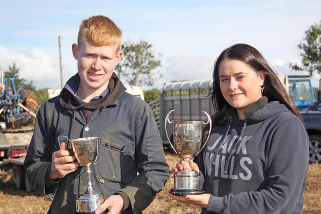 Jonathan Lemon was the winner of the young ploughman tuition class at Killead Ploughing Societyâ€TMs 104th match. He received the trophies from host Tammy McCammond. Picture: Julie Hazelton