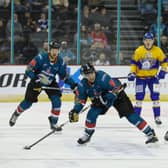 Belfast Giants’ JJ Piccinich with Fife Flyers’ Greg Chase