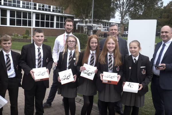 Mark Baker and Joshua Booth with Mr Massey and Glengormley students.