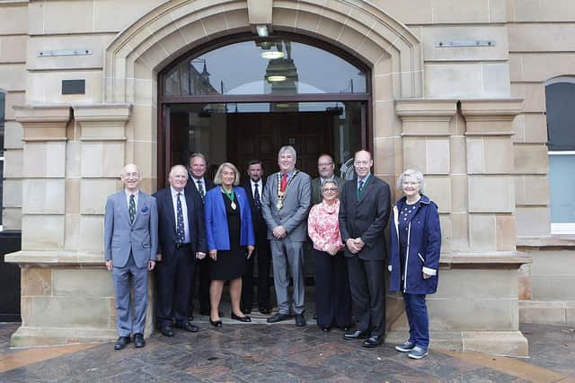 Pictured at the official handover of Coleraine Town Hall are Jeremy Simons, Alderman Norman Hillis, Henry Pollard, Wendy Hyde, Alderman George Duddy, Mayor of Causeway Coast and Glens Borough Council Councillor Richard Holmes, Edward Lord, Vivienne Littlechild, Edward Montgomery and Alderman Yvonne Boyle