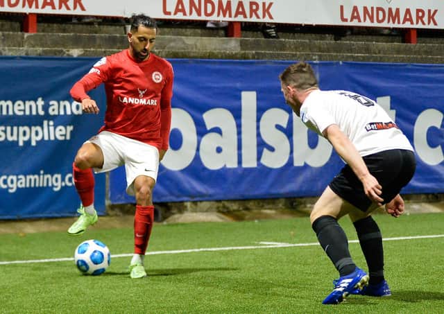 Navid Nasseri on show for Larne. Pic by Pacemaker.