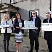 From (l-r): Kieran Moylan, Principal Officer of the Libraries Development and Community Policy Unit, Department of Rural and Community Development Ireland; Gina McIntyre, CEO The Special EU Programmes Body; Jayne Taggart, CEO, Enterprise Causeway; Andrew Molloy, Hamilton Architects; and Mark O'Donnell, Deputy Secretary for Housing, Urban Regeneration and Local Government, Department for Communities