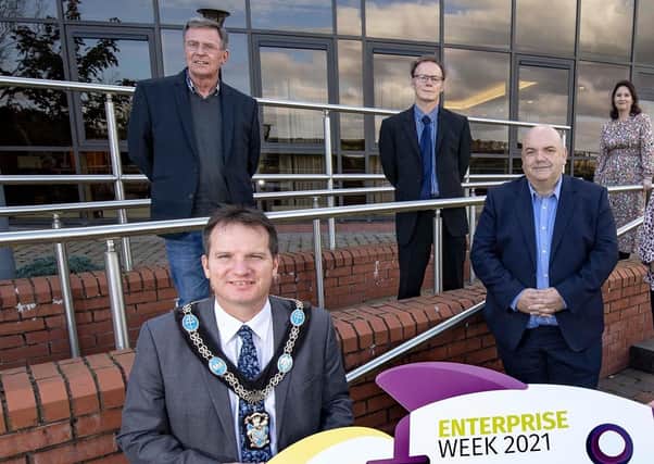 Breandan Mac Cionnaith (rear left) helping promote ABC Council's Enterprise Week. ABC Council image