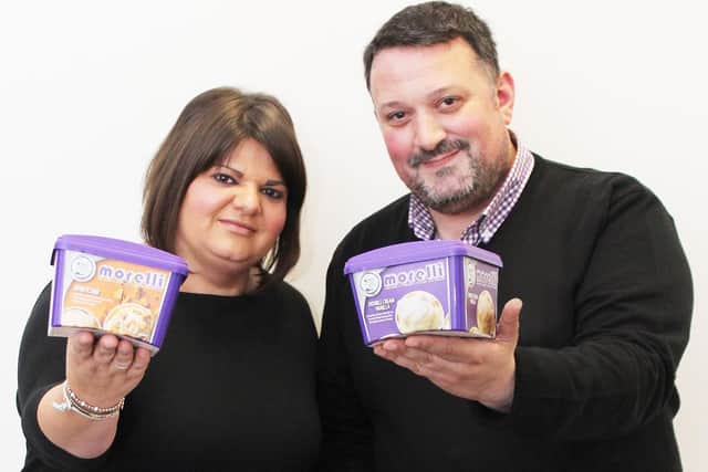 Arnaldo and sister Daniela Morelli with some of the Coleraine company's winning ice cream tubs