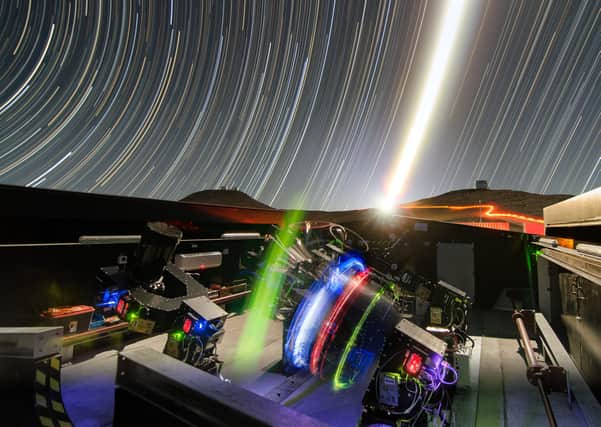 The Next-Generation Transit Survey (NGTS) is located at ESOâ€TMs Paranal Observatory in northern Chile. This project will search for transiting exoplanets â€” planets that pass in front of their parent star and hence produce a slight dimming of the starâ€TMs light that can be detected by sensitive instruments. The telescopes will focus on discovering Neptune-sized and smaller planets, with diameters between two and eight times that of Earth.This night time long-exposure view shows the telescopes during testing. The very brilliant Moon appears in the centre of the picture and the VISTA (right) and VLT (left) domes can also be seen on the horizon.