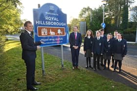 Mayor of Lisburn & Castlereagh City Council, Alderman Stephen Martin and First Minister Paul Givan MLA unveiled the new Royal Hillsborough signage with pupils from Beechlawn School.