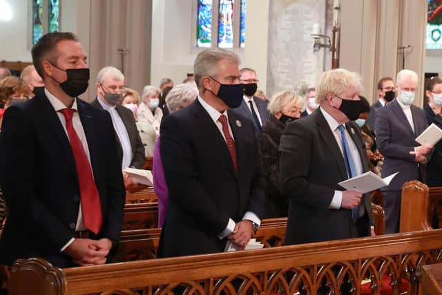 (Left to right) First Minister of NI Paul Givan, Secretary of State for Brandon Lewis and PM Boris Johnson at St Patrick's Cathedral in Armagh. Photo: Pacemaker
