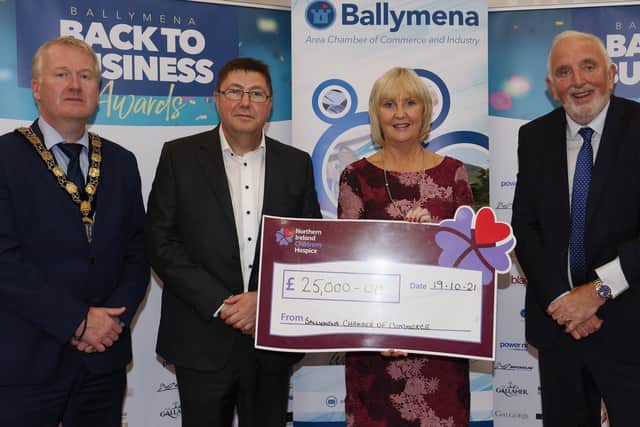 Mary McAuley of Northern Ireland Children's Hospice, who received a cheque for £25,000 from Ballymena Area Chamber of Commerce committee members Eugene Reid, James Walker and Tom Wiggins at at the Ballymena Back to Business Awards in the Tullyglass Hotel.