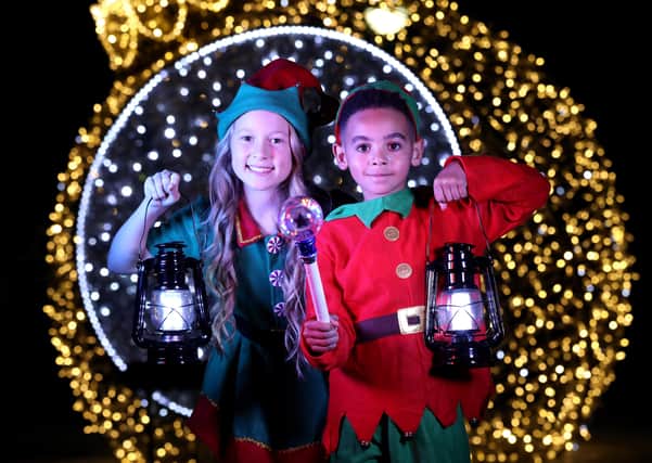 Elves Jessica and Giovanni celebrate the return of the Enchanted Winter Garden, at Antrim Castle Gardens. Picture by Darren Kidd/PressEye