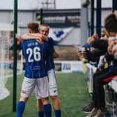 Conor McKendry congratulates Matthew Shevlin after his second goal. PICTURE: David Cavan