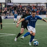 Coleraine’s Josh Carson holds off his opponent. Picture: David Cavan