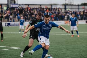 Coleraine’s Josh Carson holds off his opponent. Picture: David Cavan