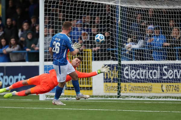 Matthew Shevlin fires home his second goal against Warrenpoint Town. Picture: Desmond Loughrey/Pacemaker