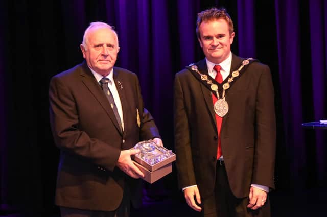 Brian Sloan Chairman of the Lisburn Branch Royal British Legion receiving a clock to commemorate 100 years of the Royal British Legion from Alderman Stephen Martin Mayor of Lisburn & Castlereagh City Council. Pic by Norman Briggs, rnbphotographyni