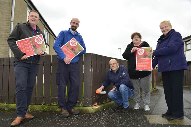 Chair of Environmental Services, Councillor Andrew Ewing, joined Sandra Prince, Tony Prince and Tracey Brooks of the Manor Park Community Association along with Lisburn & Castlereagh City Council Enforcement Officer Craig Maxwell to highlight the success of the ‘Paint Means Poo’ initiative
