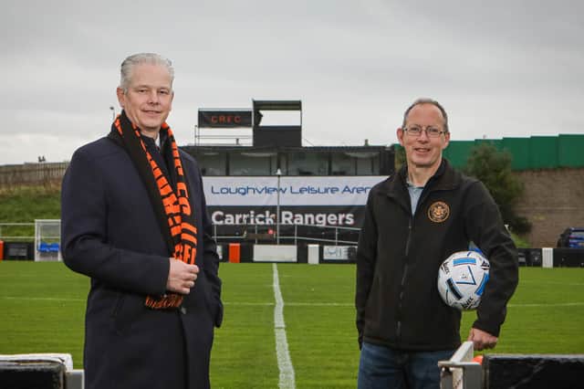 Stephen Perry (left), sales and marketing manager at Loughview Leisure Group and Peter Clarke, chairman of Carrick Rangers FC.