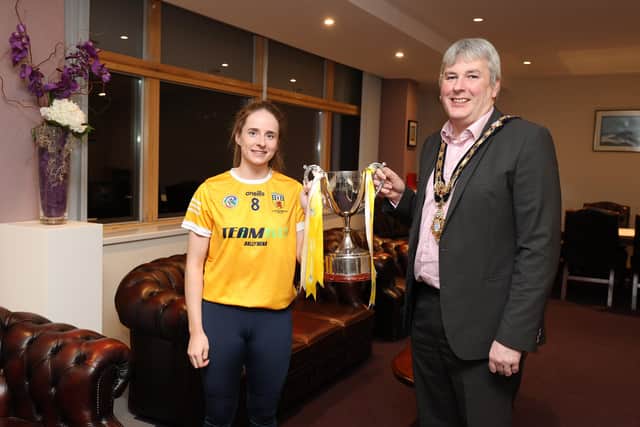 Pictured at a reception in Cloonavin is the Mayor of Causeway Coast and Glens Borough Council, Councillor Richard Holmes, and the Intermediate Antrim Camogie team captain, Lucia McNaughton from Loughgiel