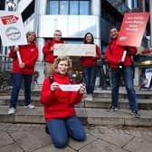 Retired Whitehead GP Dr Jeni McAughey (centre) is among five Christian Aid Ireland activists travelling to Glasgow to join street demonstrations demanding climate justice for developing countries. The others are (back row)  Rev Cheryl Meban from Lisburn, Stephen Trew from Lurgan, Helen Newell from Belfast and Darren Vermaak from Dublin. Photo: Kelvin Boyes/Press Eye.