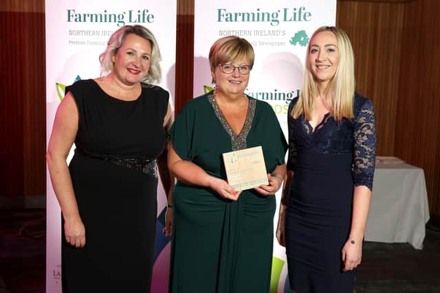 Gillian Reid was named as the Woman of Excellence in  Agriculture. Making the presentation are Andrena  O'Prey, Farming Life, and Gillian Hodge. Picture: Steven McAuley