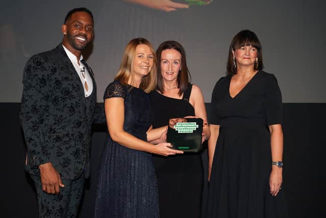 The award winning Northern Trust Macmillan Skin Cancer Team are pictured with host for the evening Richard Blackwood. Pictured L-R: Lynsey Atkinson, Macmillan Skin Cancer Nurse; Joeleen McNamee, Macmillan Skin Support Worker and Michelle Reid, Skin Cancer Nurse