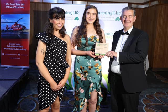 Dearbhle McLaughlin was the winner of the Agricultural Student of the Year award. Making the presentation are Joanne Knox, Farming Life, and Edwin Poots, Minister of Agriculture,  Environment and Rural Affairs. Picture: Steven McAuley