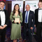 Milbank Farm received the award for Farming Family of the Year. Making the presentation was Ben Lowry, editor News Letter and Michael Munnelly, Karro Cookstown. Picture: Steven McAuley